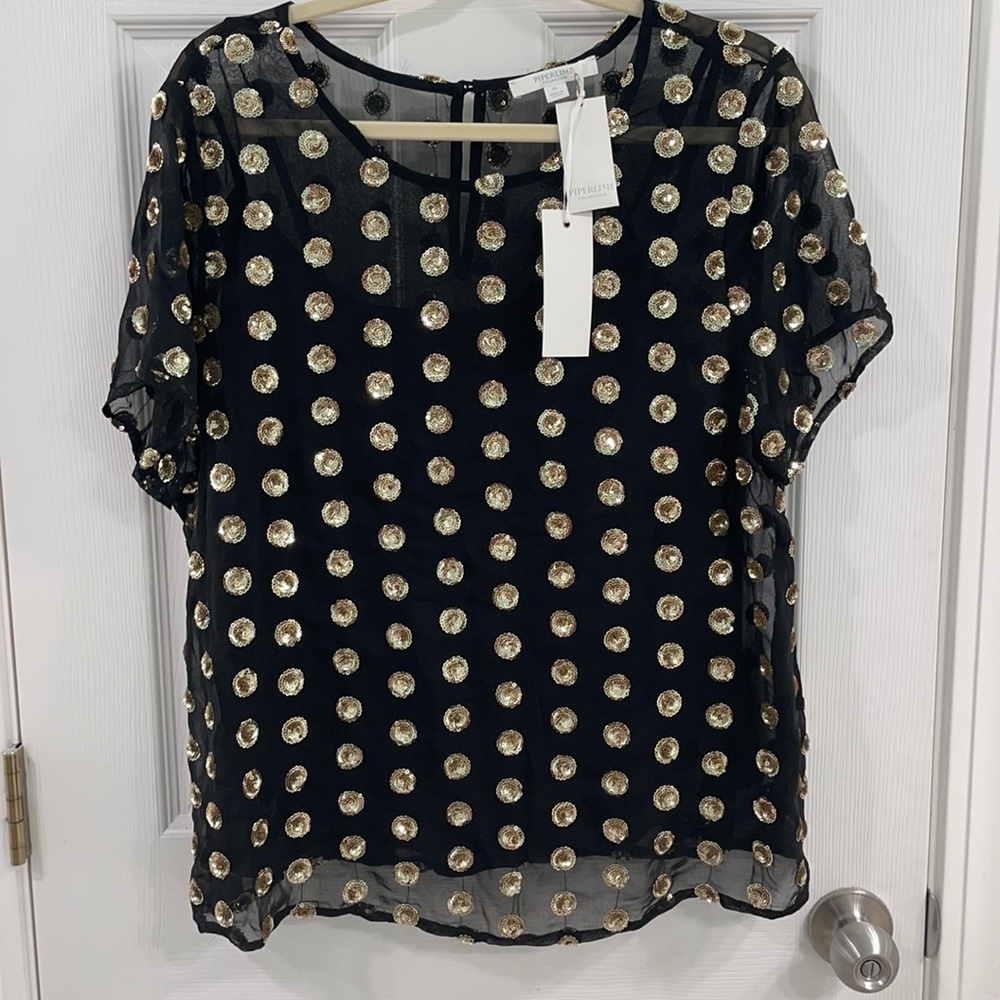 Black top with gold sequin embellishments. Size XL